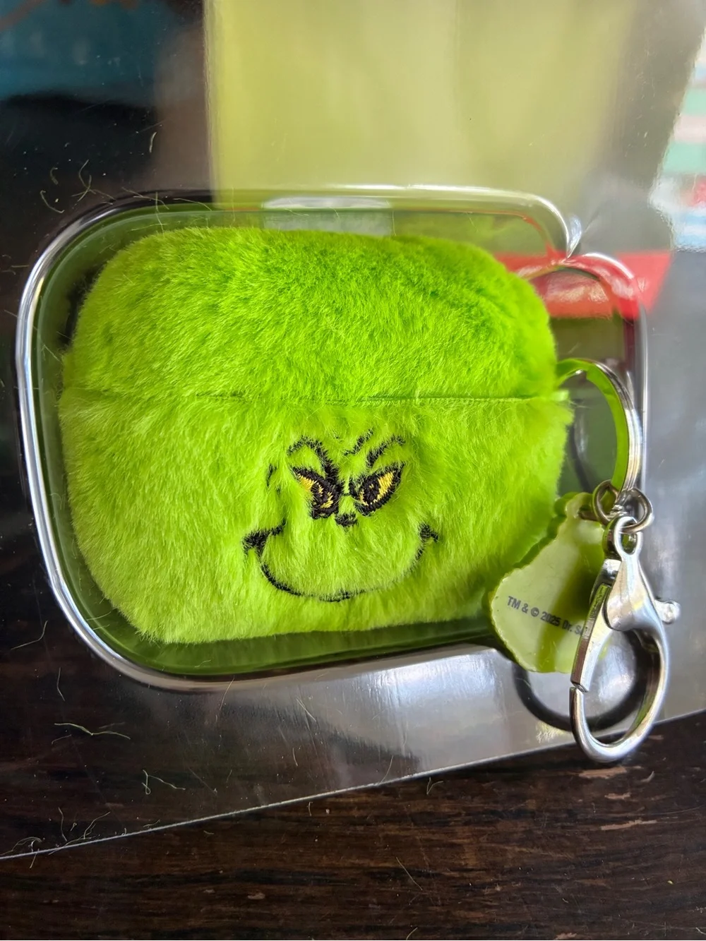 The Grinch Plush AirPods Pro Case in Bright Green with Keyring